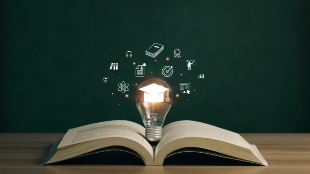 E-learning graduate certificate program concept. lightbulb on the book with graduation hat, and education icons. Internet education course degree, Idea of learning online class.Webinar Online Courses